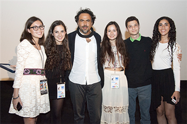 Post-Remembrance team Danielle Stolz, Cosima Elwes, Hana Kateman, David Woldenberg, and Marianne Verrone pose with Alejandro Iñárritu.